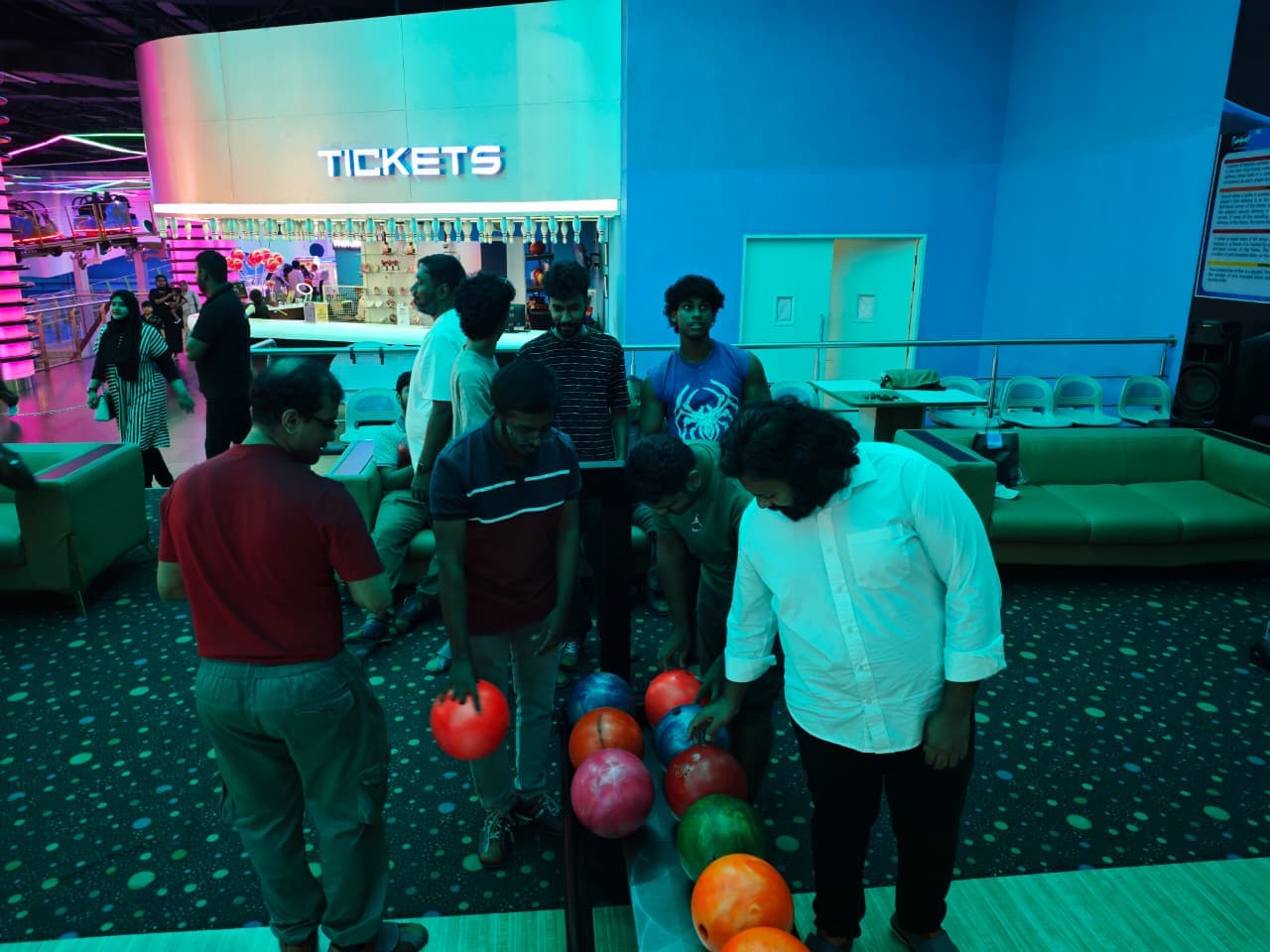 Men from ECC choosing bowling balls